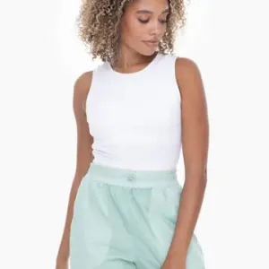 NB SEAMLESS RIBBED HIGH NECK ACTIVE TANK